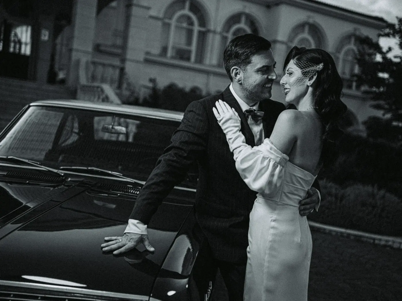 Hyulia and Slav by a vintage car — fine-art session